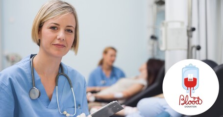Portrait of doctor against donor and nurse by blood donation symbol at hospital