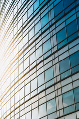 Round modern office building - glass wall - close-up