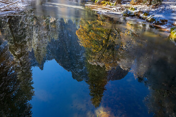 Merced River. Autumn first snow in Yosemite National Park, California, USA.