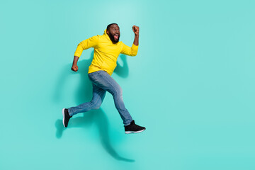 Fototapeta na wymiar Full size profile side photo of carefree guy jump run fast season bargain isolated over cyan color background