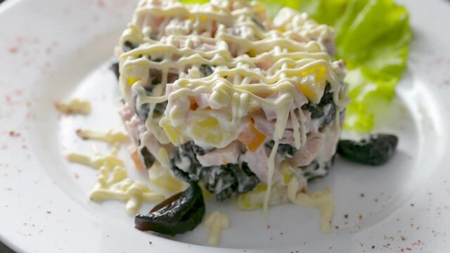 Salad with prunes, vegetables and meat