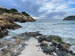 beach, sea and rocks landscape.