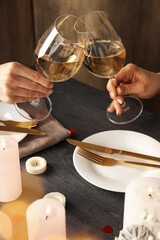 Happy Valentine day dinner on dark wooden table