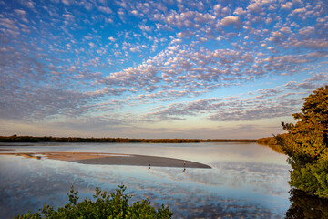 Sunrise clouds over ponds at Ding Darling National Wildlife Refuge in Sanibel Island, Florida, USA