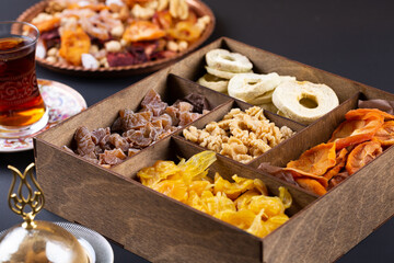 Assortment of dried fruits in gift box for Novruz holiday in Azerbaijan. Eastern spring equinox celebration nowruz