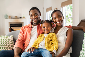 Happy black family with one child