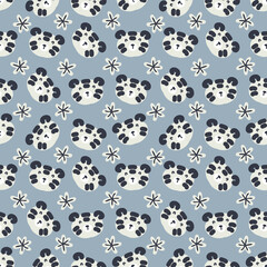 Doodle seamless pattern with tiger faces and snowflakes. Perfect for T-shirt, textile and print. Hand drawn illustration for decor and design.