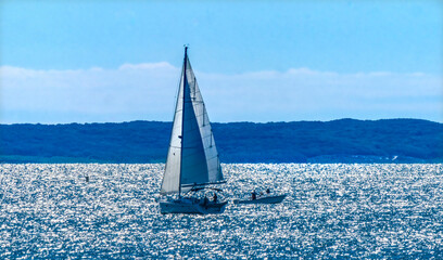 Fototapeta na wymiar Colorful sailboats, Elizabeth Islands, Padanaram Harbor, Buzzards Bay, Dartmouth, Massachusetts.