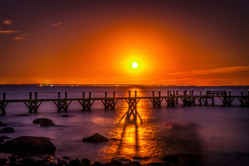 Fototapeta premium Beach pier, Buzzards Bay, Padanaram, Dartmouth, Massachusetts.