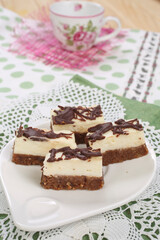 Cake with biscuits, chocolate and cream