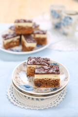 Cake with biscuits, chocolate and cream