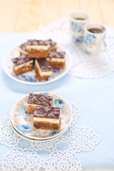 Cake with biscuits, chocolate and cream