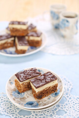Cake with biscuits, chocolate and cream