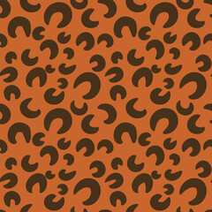 spotted animalistic seamless pattern with leopard spots, trendy animal print