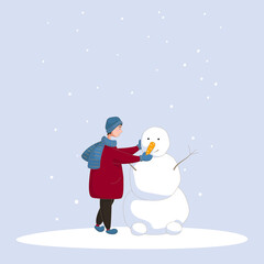 A boy makes a snowman on a snowy day. Winter holiday card.