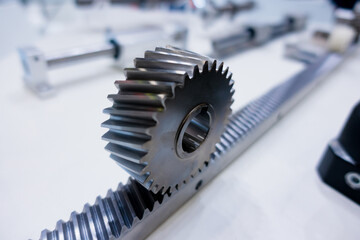 Spur gear rack and pinion. Toothed gear on a toothed shaft - obrazy, fototapety, plakaty