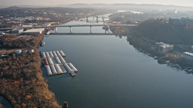 Aerial timelapse of barge and river in Chattanooga, TN.