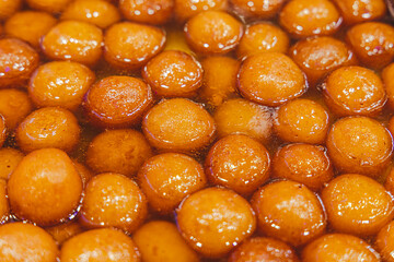 hot gulab jamun - an indian sweet served after meal