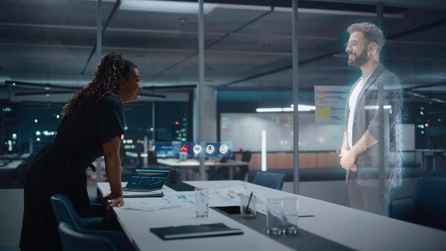 Futuristic Office Online Meeting Video Conference Call: Businesswoman and Businessman Talk using Augmented Reality Metaverse. Global e-Business For Virtual Remote Work. Hologram Concept Simulation