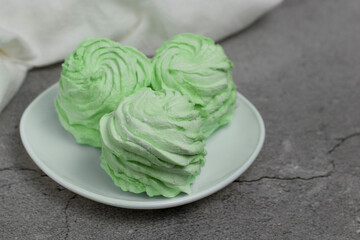 Close up green mojito flavored marshmallow (Zefir).