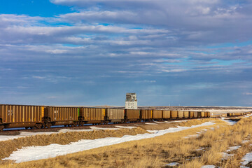 Rail cars and old granary near Choteau, Montana, USA - obrazy, fototapety, plakaty