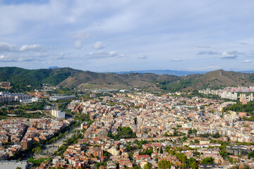 City view with landscape on Barcelona. Hills aerial view. Spain architecture