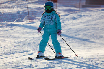 A man is skiing in the snow