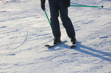 A man is skiing in the snow