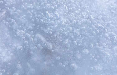 Blue crystals of snow and ice as an abstract background.