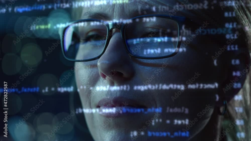 Poster Portrait of Female Startup Digital Entrepreneur Working on Computer, Line of Code Projected on His Face and Reflecting in Glasses. Developer Working on Innovative e-Commerce App using AI and Big Data