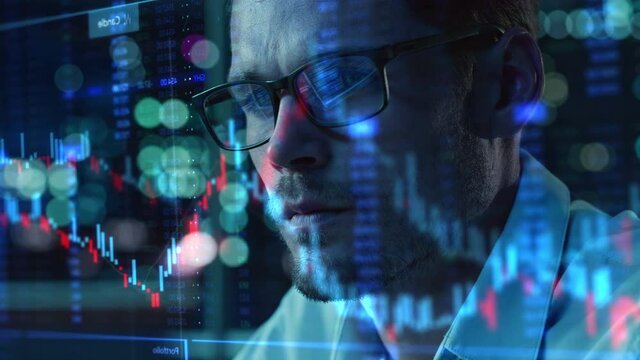 Stock Market Trader Working Investment Charts, Graphs, Ticker Numbers Projected on His Face and Reflecting in Glasses. Financial Analyst, Digital Entrepreneur doing Social Trading with Innovative App