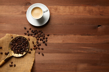 A cup of coffee on a wooden table
