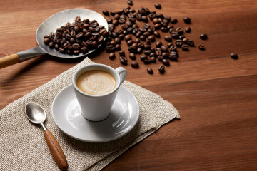 A cup of coffee on a wooden table