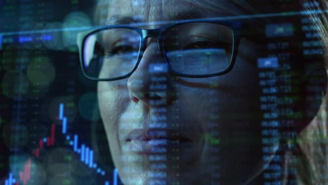 Portrait of Female Digital Entrepreneur Working on Computer, Line of Code Projected on His Face and Reflecting in Glasses. Developer Working on Innovative e-Commerce App using AI and Big Data