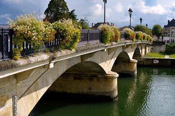 Flowery bridge and Charente river at Saintes, a commune and historic town in western France, in the...