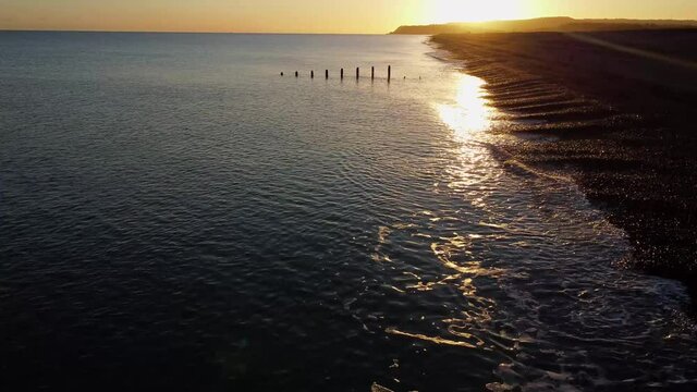 Sunset over sea and beach