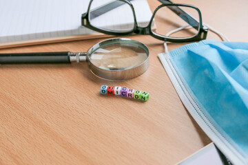 OMICRON letterings on colorful cubes. Covid19 new variant concept