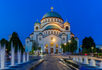 Great Orthodox Temple with  fountain at Night.Cathedral of Saint Sava at evening, Belgrade, Serbia. The Temple of Saint Sava is a Serbian Orthodox church which sits on the Vračar plateau in Belgrade. - obrazy, fototapety, plakaty
