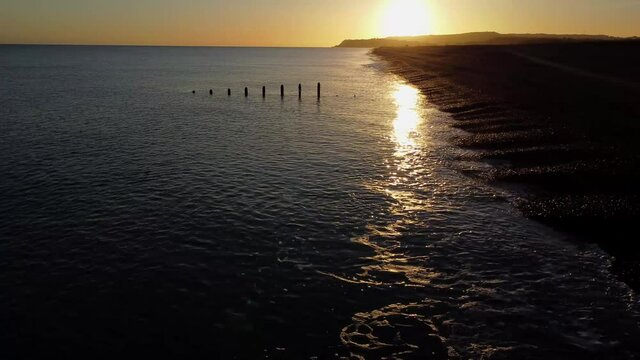Sunset over sea and beach