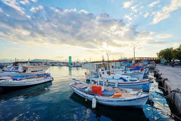 Fototapeta na wymiar Harbor with leisure and fishing boats at anchor, Perdika, Egina Island, Greece.