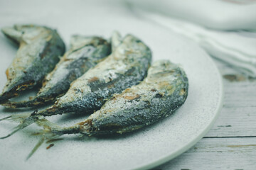 Four fried mackerel