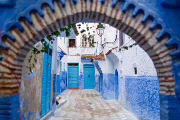 Street in medina of blue town Chefchaouen, Morocco.