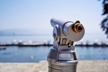 Coin Operated Spyglass viewer next to the waterside promenade looking out to the bay.