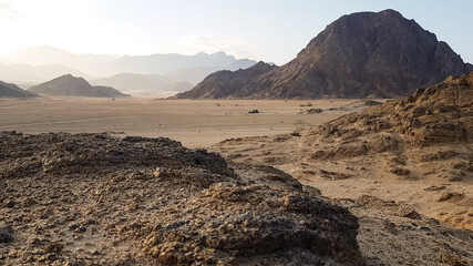 the image of the mountains on the Sinai Peninsula at sunset. the desert of Sharm el Sheikh in the evening. excursion in Egypt. travel.