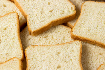 Sliced toast bread close-up. Full screen baked goods