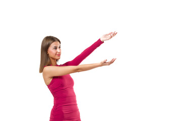 Woman showing or present something while standing over an isolated background.