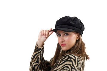 Stylish woman looking at the camera while posing over an isolated background.