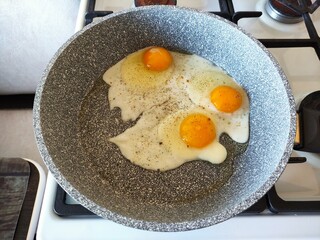Scrambled eggs from three eggs fried in a pan