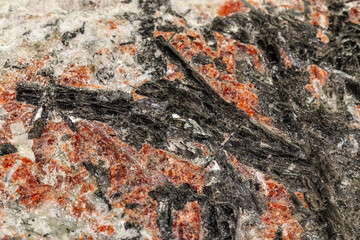 Macro of a stone Stibnite mineral on a white background