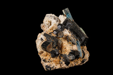 Macro stone mineral tourmaline aquamarine with a black background